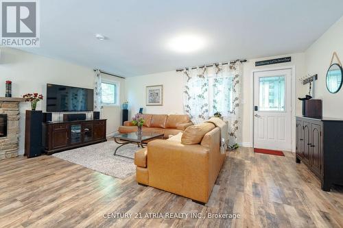 1335 Furniss Drive, Ramara (Brechin), ON - Indoor Photo Showing Living Room With Fireplace