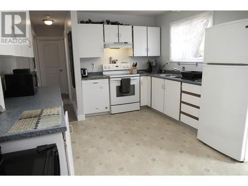 8803 87 Street, Fort St. John, BC - Indoor Photo Showing Kitchen With Double Sink