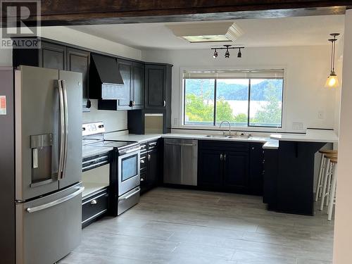 811 Oceanview Drive, Daajing Giids City, BC - Indoor Photo Showing Kitchen With Double Sink