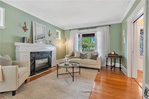 74 Balmoral Avenue S, Hamilton, ON - Indoor Photo Showing Living Room With Fireplace