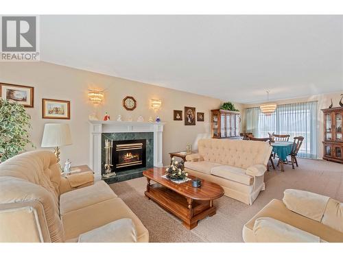 2051 3 Avenue Se, Salmon Arm, BC - Indoor Photo Showing Living Room With Fireplace