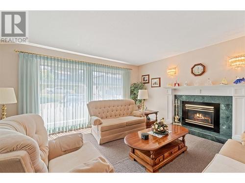 2051 3 Avenue Se, Salmon Arm, BC - Indoor Photo Showing Living Room With Fireplace