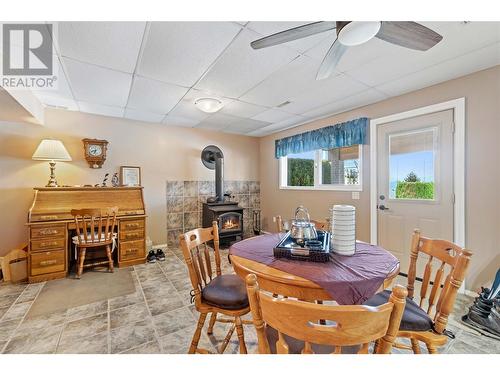 2051 3 Avenue Se, Salmon Arm, BC - Indoor Photo Showing Dining Room With Fireplace