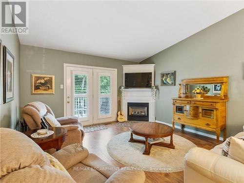 9 - 35 Stratford Terrace, Brantford, ON - Indoor Photo Showing Living Room With Fireplace