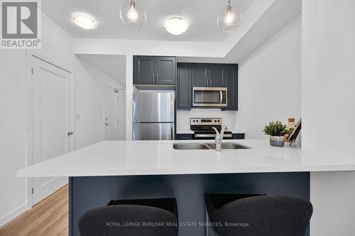 801 - 470 Dundas Street E, Hamilton (Waterdown), ON - Indoor Photo Showing Kitchen With Double Sink With Upgraded Kitchen