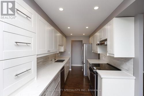 2208 - 3650 Kaneff Crescent, Mississauga (Mississauga Valleys), ON - Indoor Photo Showing Kitchen With Double Sink