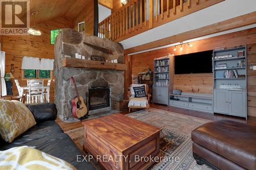 273 Fire Route 330, Galway-Cavendish And Harvey, ON - Indoor Photo Showing Living Room With Fireplace