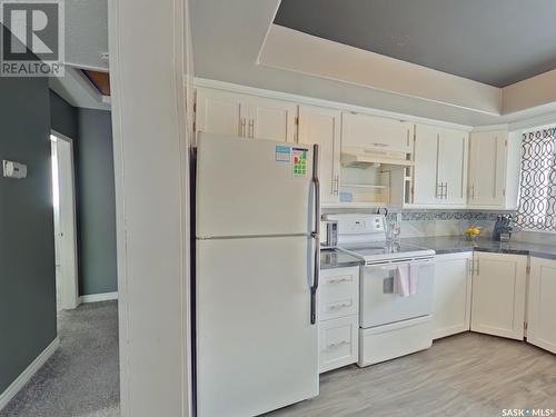 1520 6Th Avenue N, Regina, SK - Indoor Photo Showing Kitchen With Double Sink