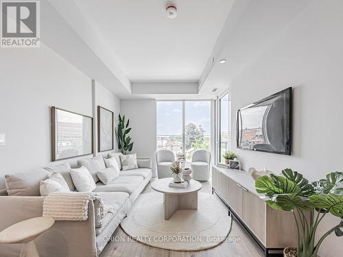 212 - 201 Brock Street S, Whitby (Downtown Whitby), ON - Indoor Photo Showing Living Room