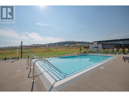 105 Predator Ridge Drive Unit# 4, Vernon, BC - Outdoor With In Ground Pool With View