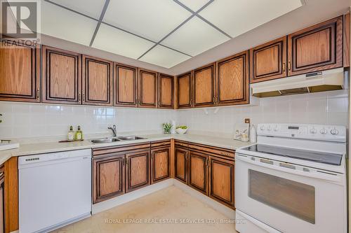 1705 - 2180 Marine Drive, Oakville (Bronte West), ON - Indoor Photo Showing Kitchen With Double Sink