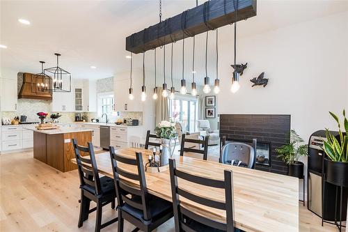 306 Duchek Drive, Ritchot Rm, MB - Indoor Photo Showing Dining Room With Fireplace