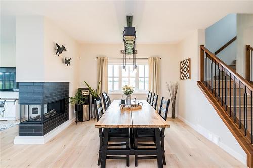 306 Duchek Drive, Ritchot Rm, MB - Indoor Photo Showing Dining Room With Fireplace