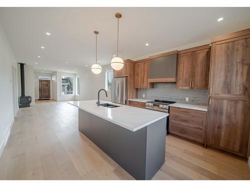 107 Sullivan Drive, Kimberley, BC - Indoor Photo Showing Kitchen With Stainless Steel Kitchen With Double Sink With Upgraded Kitchen