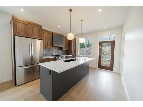 107 Sullivan Drive, Kimberley, BC - Indoor Photo Showing Kitchen With Stainless Steel Kitchen With Double Sink With Upgraded Kitchen