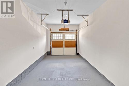 Upper - 385 Threshing Mill Boulevard, Oakville, ON - Indoor Photo Showing Garage