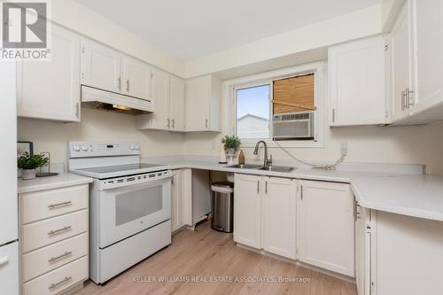 50 - 341 Wilson Drive, Milton (Dorset Park), ON - Indoor Photo Showing Kitchen With Double Sink