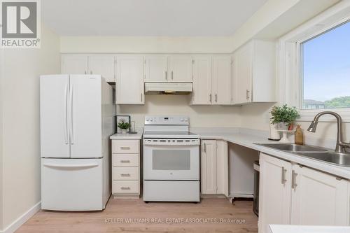 50 - 341 Wilson Drive, Milton (Dorset Park), ON - Indoor Photo Showing Kitchen With Double Sink