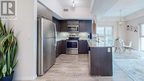 909 - 2152 Lawrence Avenue E, Toronto (Wexford-Maryvale), ON - Indoor Photo Showing Kitchen With Stainless Steel Kitchen With Upgraded Kitchen