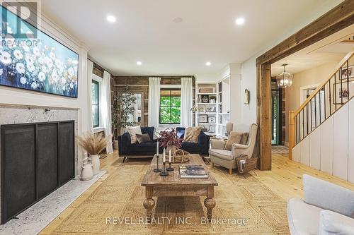 7399 Bell School Line, Milton (Nelson), ON - Indoor Photo Showing Other Room With Fireplace