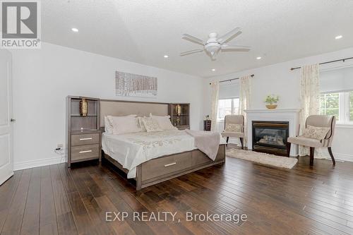 4 Champion Court, Brampton (Credit Valley), ON - Indoor Photo Showing Bedroom With Fireplace