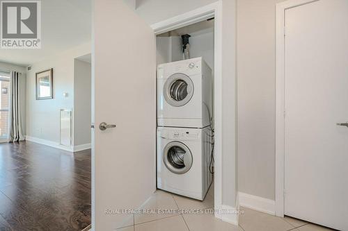 504 - 2470 Prince Michael Drive, Oakville (Iroquois Ridge North), ON - Indoor Photo Showing Laundry Room