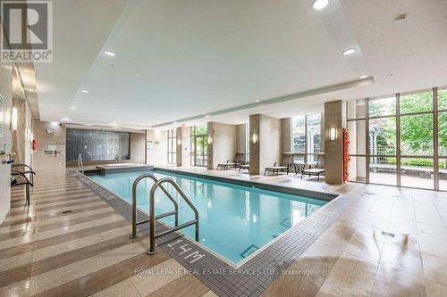 504 - 2470 Prince Michael Drive, Oakville (Iroquois Ridge North), ON - Indoor Photo Showing Other Room With In Ground Pool