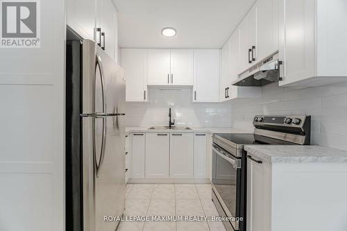 8 Giles Court, Toronto (Mount Olive-Silverstone-Jamestown), ON - Indoor Photo Showing Kitchen With Stainless Steel Kitchen With Upgraded Kitchen