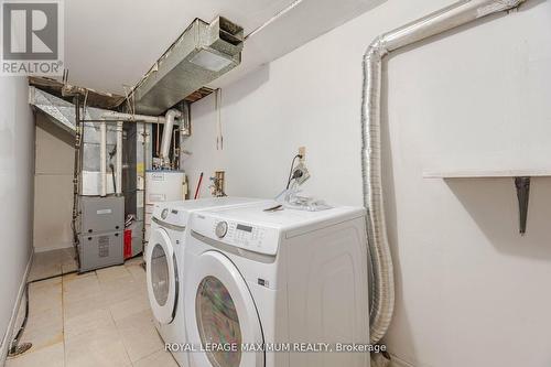 8 Giles Court, Toronto (Mount Olive-Silverstone-Jamestown), ON - Indoor Photo Showing Laundry Room