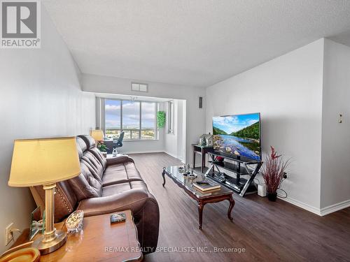 1408 - 20 Cherrytree Drive, Brampton, ON - Indoor Photo Showing Living Room