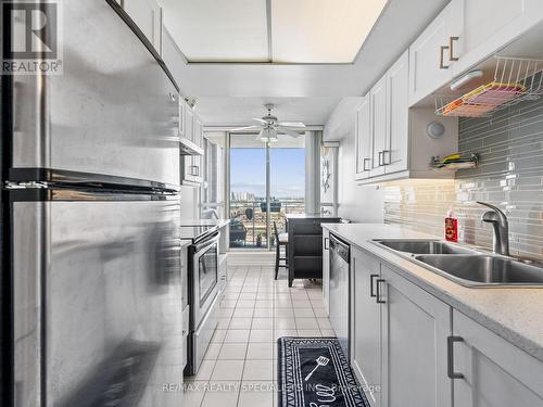 1408 - 20 Cherrytree Drive, Brampton, ON - Indoor Photo Showing Kitchen With Double Sink