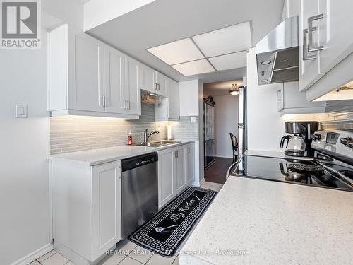 1408 - 20 Cherrytree Drive, Brampton, ON - Indoor Photo Showing Kitchen With Double Sink