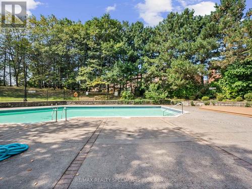 1408 - 20 Cherrytree Drive, Brampton, ON - Outdoor With In Ground Pool