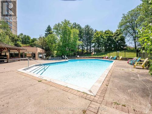 1408 - 20 Cherrytree Drive, Brampton, ON - Outdoor With In Ground Pool With Backyard