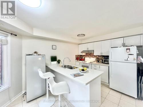 2 - 3395 Thomas Street S, Mississauga (Churchill Meadows), ON - Indoor Photo Showing Kitchen With Double Sink