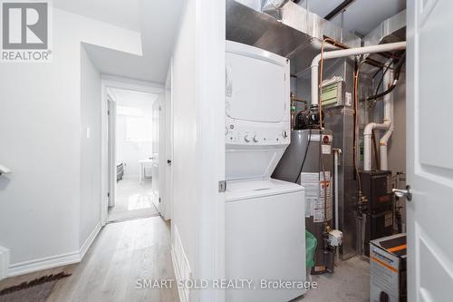 10 - 252 Penetanguishene Road, Barrie (Georgian Drive), ON - Indoor Photo Showing Laundry Room