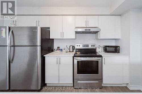 10 - 252 Penetanguishene Road, Barrie (Georgian Drive), ON - Indoor Photo Showing Kitchen With Stainless Steel Kitchen