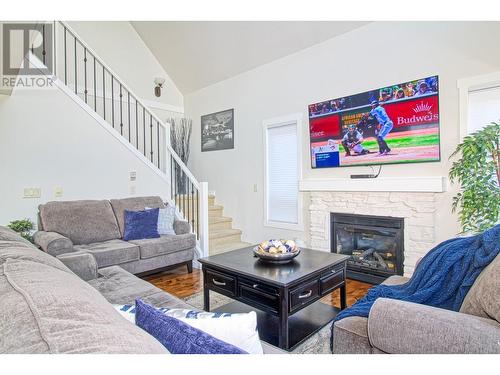 6985 Barcelona Drive Unit# 24, Kelowna, BC - Indoor Photo Showing Living Room With Fireplace