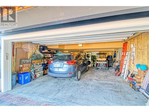 6985 Barcelona Drive Unit# 24, Kelowna, BC - Indoor Photo Showing Garage