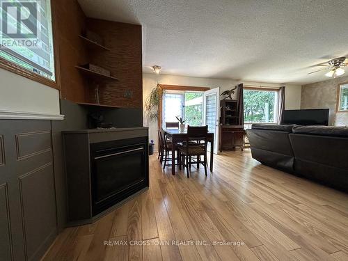 869 10Th Line, Innisfil, ON - Indoor Photo Showing Living Room With Fireplace