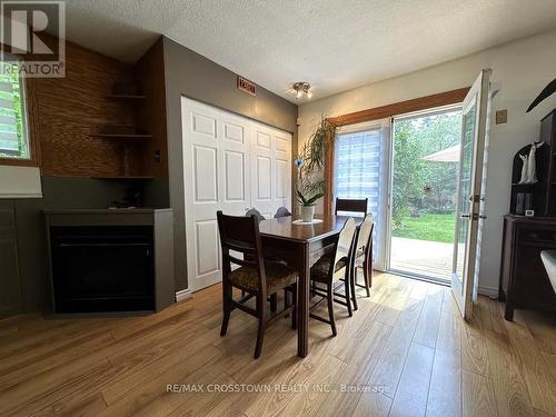 869 10Th Line, Innisfil, ON - Indoor Photo Showing Dining Room With Fireplace