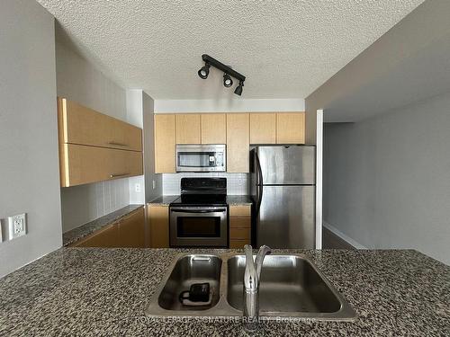 2511-11 Brunel Crt, Toronto, ON - Indoor Photo Showing Kitchen With Double Sink