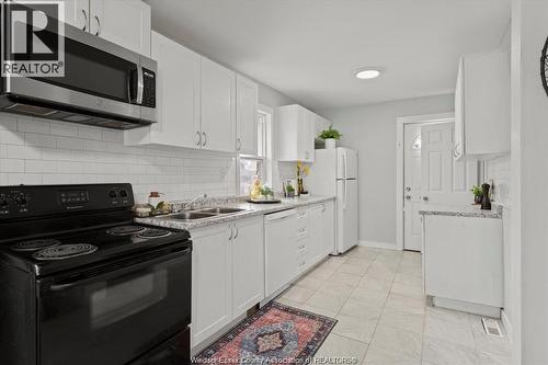 1014 Felix Avenue, Windsor, ON - Indoor Photo Showing Kitchen With Double Sink