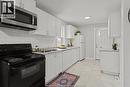 1014 Felix Avenue, Windsor, ON  - Indoor Photo Showing Kitchen With Double Sink 