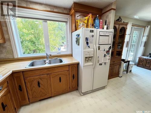 202 Hood Street, Maple Creek, SK - Indoor Photo Showing Kitchen With Double Sink