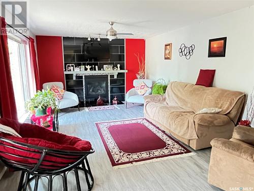 202 Hood Street, Maple Creek, SK - Indoor Photo Showing Living Room With Fireplace