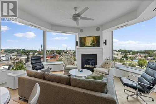 15 St Andrew Street Unit#1205, Brockville, ON - Indoor Photo Showing Living Room With Fireplace