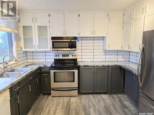 230 Ash Street, Outlook, SK - Indoor Photo Showing Kitchen With Double Sink