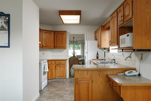 27-2200 Gordon Drive, Kelowna, BC - Indoor Photo Showing Kitchen With Double Sink