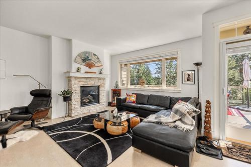 14-2283 Shannon Heights Court, West Kelowna, BC - Indoor Photo Showing Living Room With Fireplace